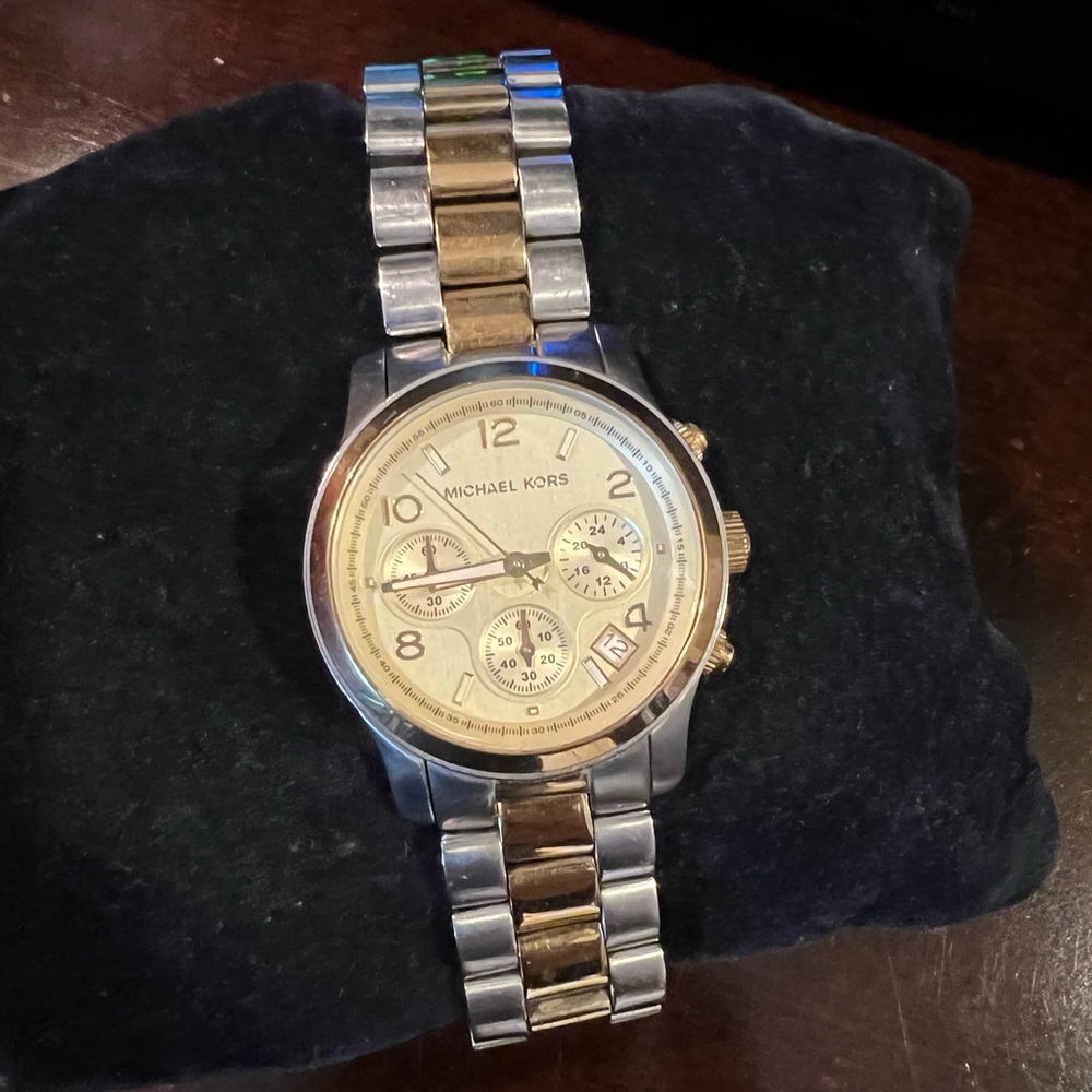 Larger face watch in good condition silver and gold. No box or extra links